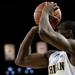 Michigan junior Tim Hardaway Jr. shoots in the second half of the game against Binghamton on Tuesday. Daniel Brenner I AnnArbor.com